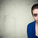 Female subjected to possible eye injury or loss due to car accident.