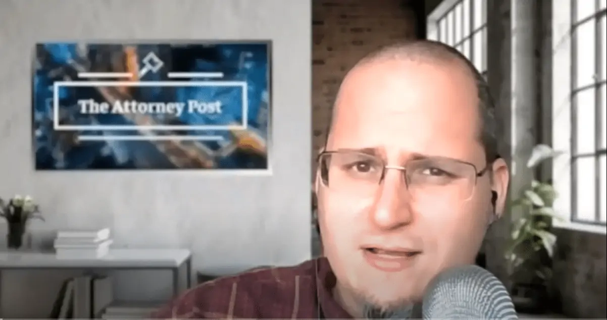 man speaking on a microphone