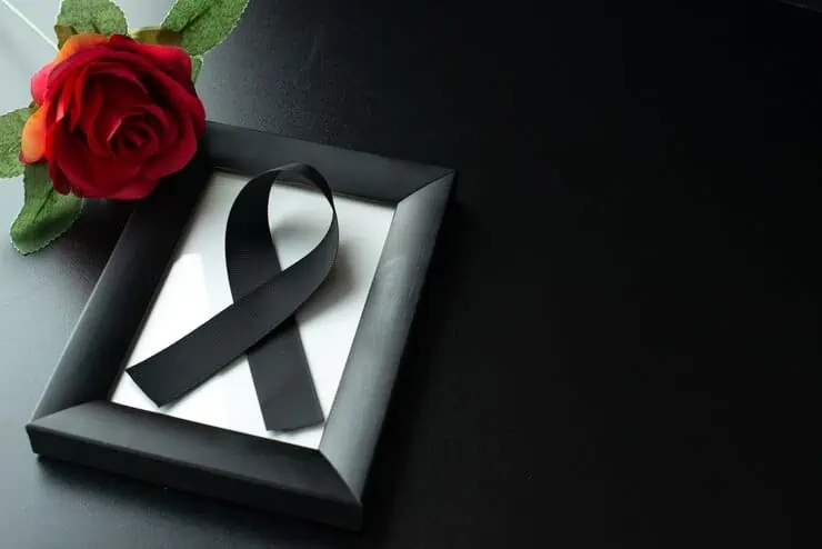 austin wrongful death lawyers rose and a frame with a black ribbon