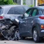 Two-vehicle collision in the crosswalk, posing a danger to pedestrians, relevant for personal injury claims.