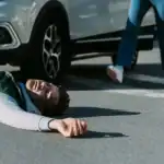Injured man on road, pedestrian accidents