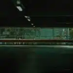 Dimly lit, empty parking garage illustrating a negligent security hazard